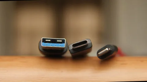5 different smartphone charging connectors. Time lapse where only USB-C remains. Stock Footage 260122378
