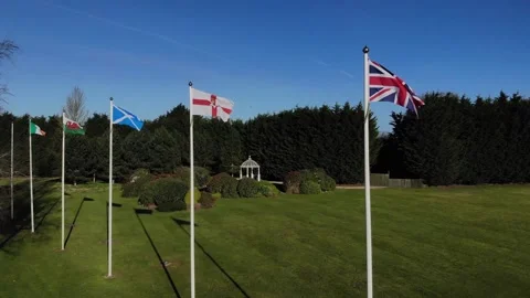 5 Flags in wind, Union Flag, England, Ireland, Scotland, Wales Stock Footage 151177375