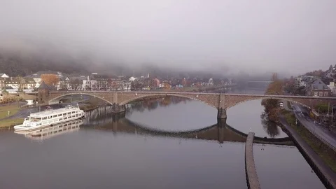 5 | FOG SETTING WHILE APPROACHING BRIDGE IN COCHEM | AERIAL Stock Footage 98993694