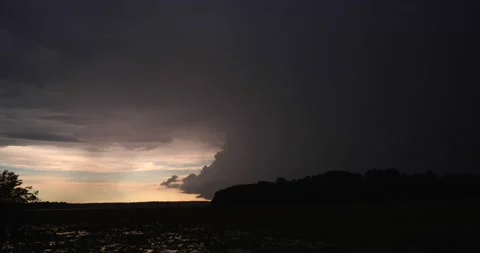5 high altitude, spider lightning strikes fill right frame over ominous sunset Stock Footage 137427561
