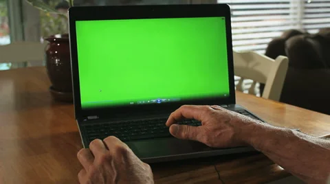 5 LAPTOP GREENSCREEN DOLLY IN Stock Footage 33847189