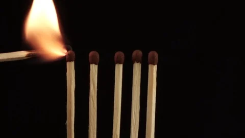 5 matches light up one by one and smoulder Video stock 120145147