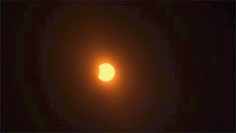 5% Partial Eclipse covered by the Moon. Stock Photos