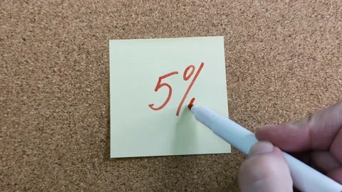 5% with a red marker on a yellow sticker 스톡 동영상 170829923