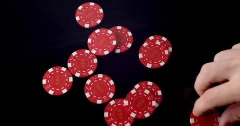 $5 red poker chips removed from black reflective background Stock Footage 112332323