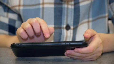 5 year old boy playing on smartphone, chroma key Stock Footage 170692433