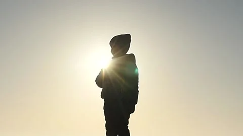 5 years old boy cross oneself slow motion silhouette Stock Footage 172431197