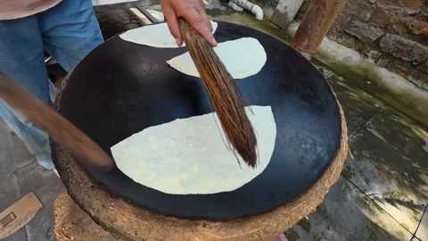 50  Baking Chinese stuffed flatbread , rural Shandong, China, 21 Jan 2026 Stock Footage 345884058