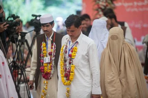 50 couples getting married in CM House Stock Photos