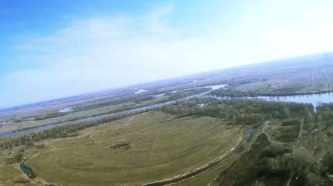 50 seconds of flight towards  river .Aerial with lists like bird Stock Footage 61751921