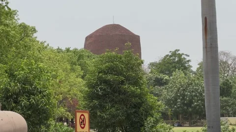 500 CE buddhist stupa in saarnath The Dhamek Stupa in Sarnath, near Varanasi Stock Footage 312930527