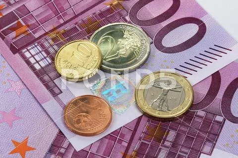 500 Euro banknotes and euro coins Stock Photos