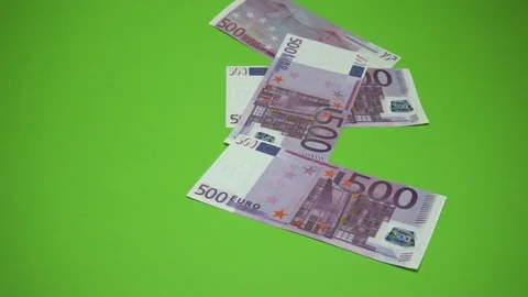 500 euros notes is falling into green background. Slow motion 120fps Video stock 85395735