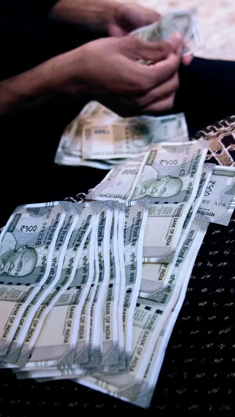 500 Rupee Indian Currency Notes Spread on Surface with Person Counting Video stock 332101435