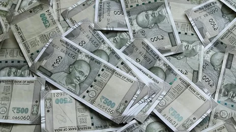 500 rupees banknotes falling on 500 rupees background. Slow motion video. Stock Footage 277159624