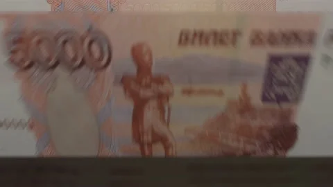 5000 rubles banknotes in cash machine. Rub cash counting video.	 Video stock 168560988