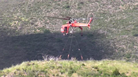 500kV Tower Construction Contruction Air Crane lowering piece Stock Footage 48001044