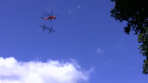 500kV Tower Construction Contruction Air Crane flyover with piece Video stock 48002331