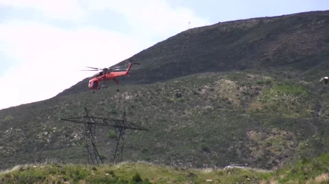 500kV Tower Construction Contruction Air Crane lowering piece Stock Footage 48003085