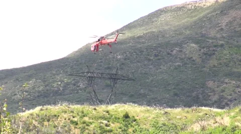 500kV Tower Construction Contruction Air Crane lowering piece Stock Footage 48003150