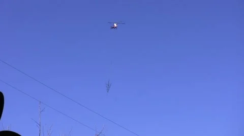 500kV Tower Construction helicopter flying in with tower leg Stock Footage 47999889