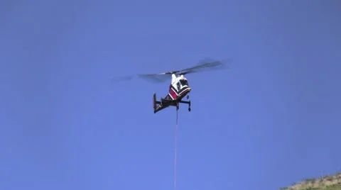 500kV Tower Construction helicopter hovering with tower leg Stock Footage 47999988