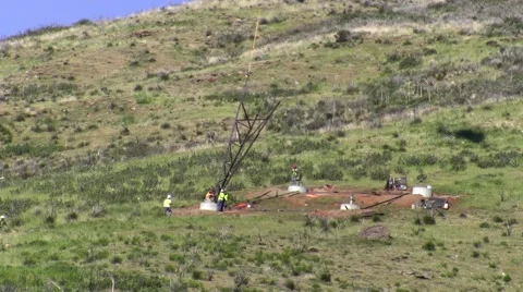 500kV Tower Construction helicopter placing tower leg Stock Footage 47999838