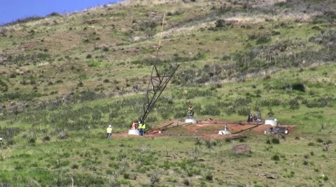 500kV Tower Construction helicopter placing tower leg Stock Footage 47999978