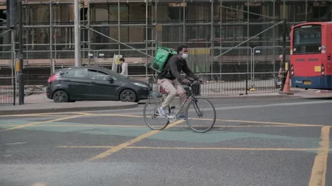 50fps. Uber Eats. Food delivery service, man on bike. Hull.06.05.2024 Stock Footage 274932089