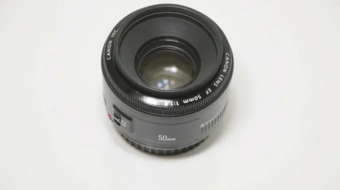 50mm lens on white background Stock Footage 35675331