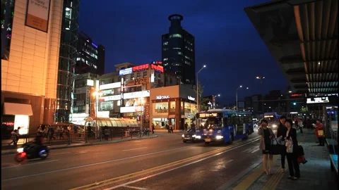 5142 Blue Hour Traffic and People Waiting for the Bus at Sinchon Station, Stock Footage 338224693