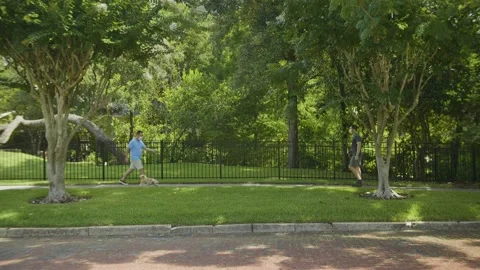 516 Profile Two people outside social distancing during the Covid19 pandemic Видео 135259522