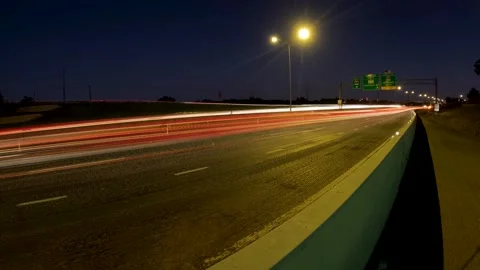 5.3K Backing Plate View - nighttime highway car light trails view Stock Footage 241200162