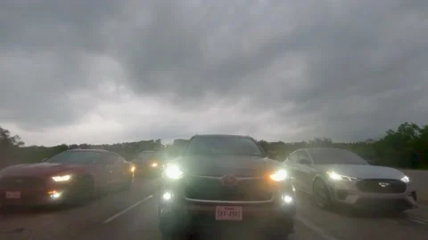 5.3K Driving Plate Rear Headlight View - stopped at traffic light intersection Stock Footage 239345419