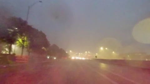 5.3K Driving Plate Rear View - during heavy rain storm lightining on expressway Stock Footage 239344545