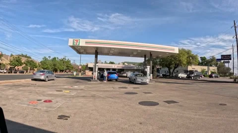 5.3K Driving Plate Side View - Driving through Gas Station Stock Footage 242058862