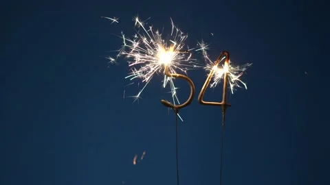 54 years celebration festive background made with Bengal fires Stock Footage 323012579
