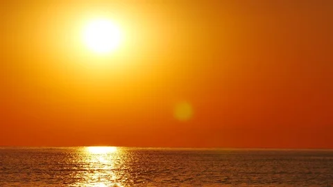 551 Sun reflection on the ocean at sunrise , cinematic 4k Stock Footage 91989375