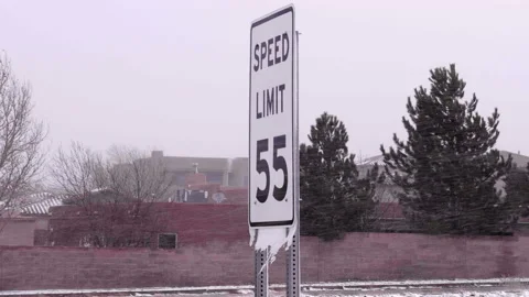55mph Speed Limit Sign During Snow Storm Stock Footage 164424342