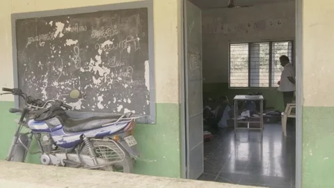 56. Teacher and students in the class Stock-Footage 149098228