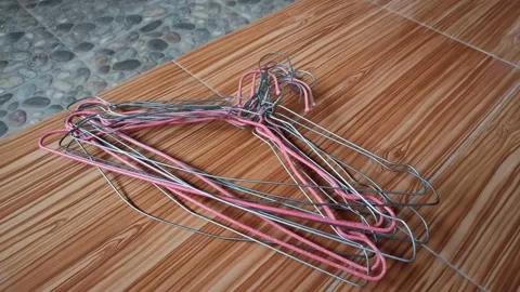 58 - pile of clothes hangers made of wire 動画素材 197042939