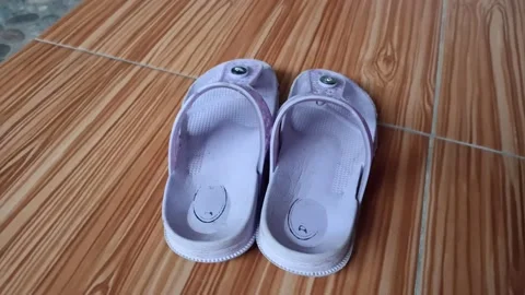 59 - a pair of cute little purple children's sandals Stock Footage 197042921