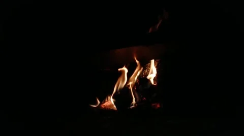 59 seconds video of a fireplace with fire on a cold evening Stock Footage 169223373
