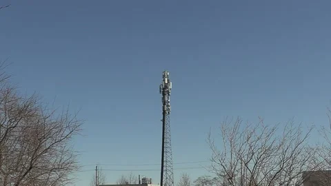 5G Cell phone and communications tower with radio antennas on it Stockbeeldmateriaal 150745191
