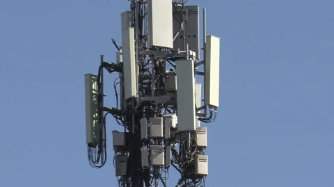 5G Cell phone and communications tower with radio antennas on it 스톡 동영상 150745491