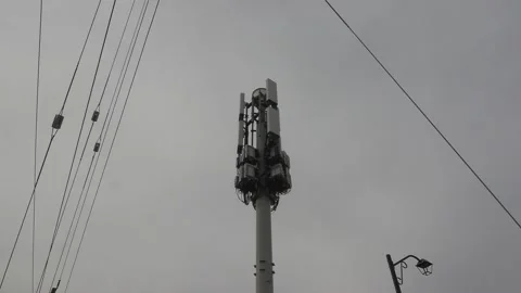 5G Cell phone and communications tower with radio antennas on it Vídeo Stock 151058029