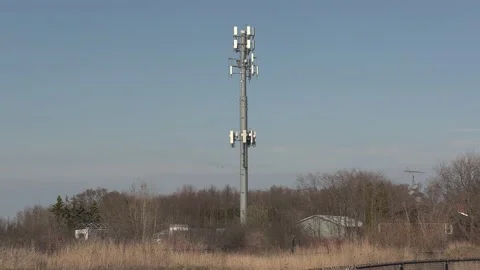 5G Cell phone and communications tower with radio antennas on it 库存影片 152004725