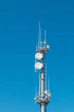 5g Cell Tower Mobile Communication tower on the background of blue sky Stock Photos