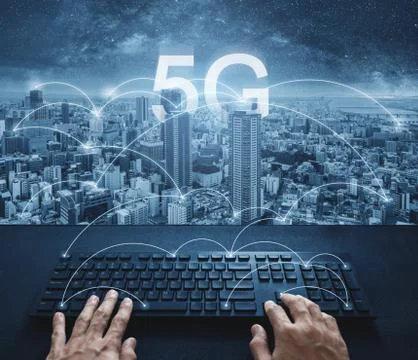 5G internet networking technology, Hand typing on computer keyboard Stock Photos