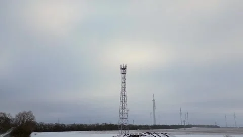 5G mast Cell Tower mobile, cold Winter Snow. Nice aerial top view flight drone Stock Footage 258801600